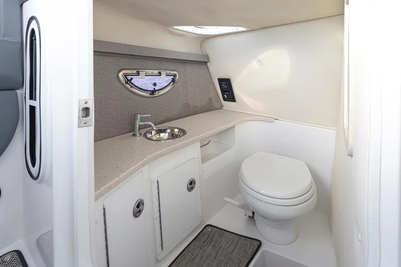 Slide: The Image of 2018 Cobalt 30 R boat interior bathroom with sink and toilet - 19