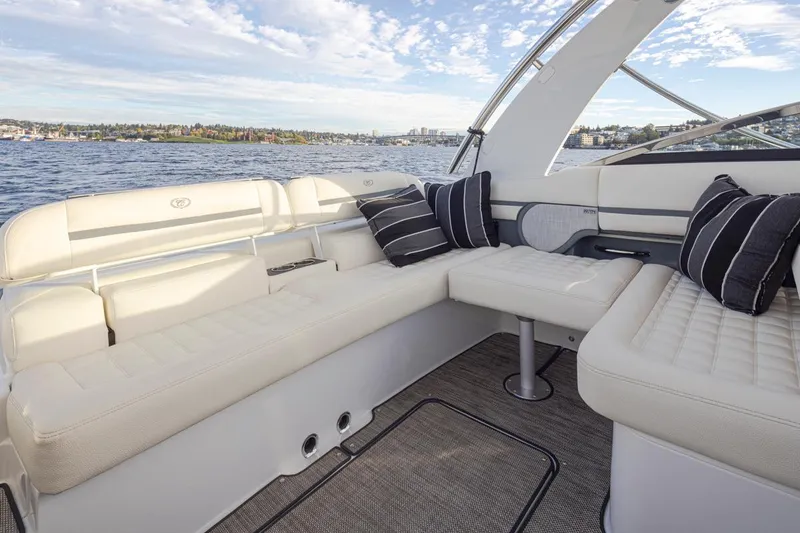 Slide: The Image of Luxurious seating area on a 2018 Cobalt 30 R boat with scenic water view. - 29