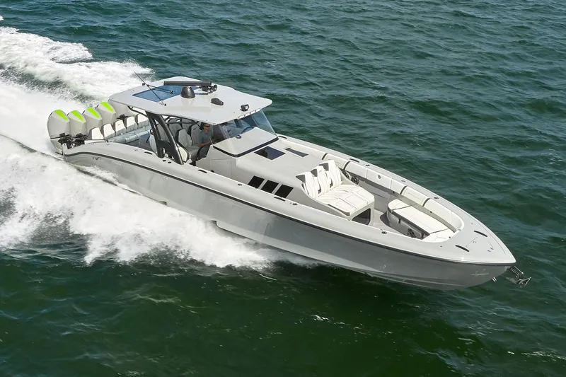 Slide: The Image of 2022 Midnight Express 43' Solstice boat cruising on open water. - 0