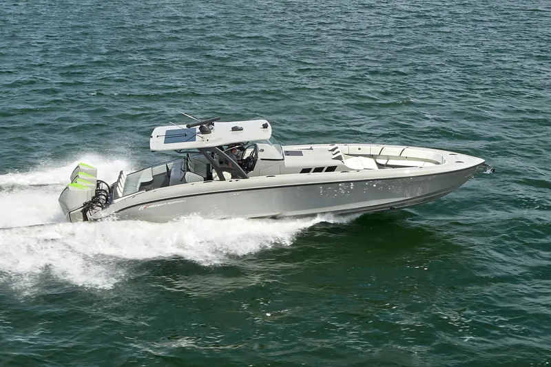 Slide: The Image of 2022 Midnight Express 43' Solstice boat cruising on open water. - 1