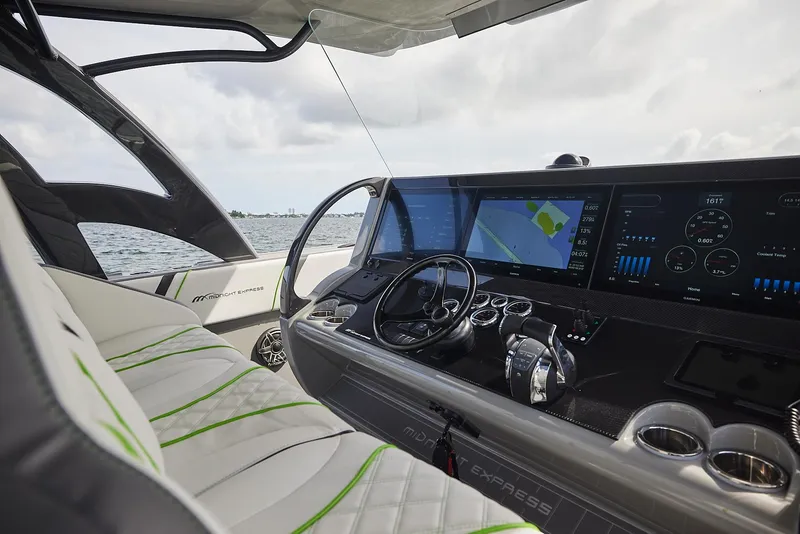 Slide: The Image of Interior of 2022 Midnight Express 43' Solstice boat with advanced navigation system. - 16