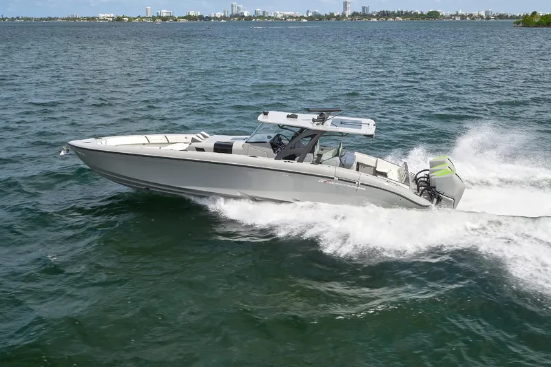 Slide: The Image of 2022 Midnight Express 43' Solstice boat cruising on open water. - 3