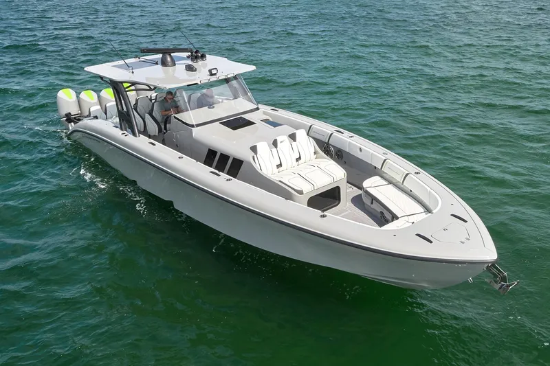 Slide: The Image of 2022 Midnight Express 43' Solstice boat cruising on clear water. - 8