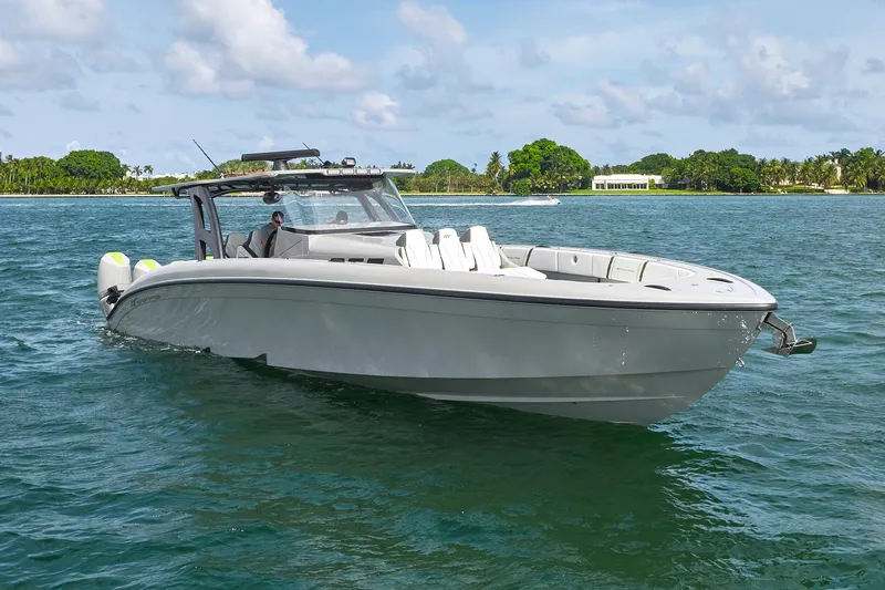 Slide: The Image of 2022 Midnight Express 43' Solstice boat cruising on calm waters. - 9