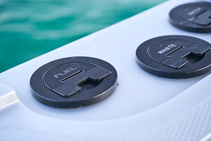 Slide: The Image of Fuel and waste caps on a 2021 Midnight Express 43' Open boat. - 19