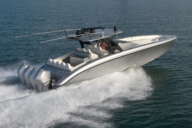 Slide: The Image of 2021 Midnight Express 43' Open boat cruising on the water. - 2