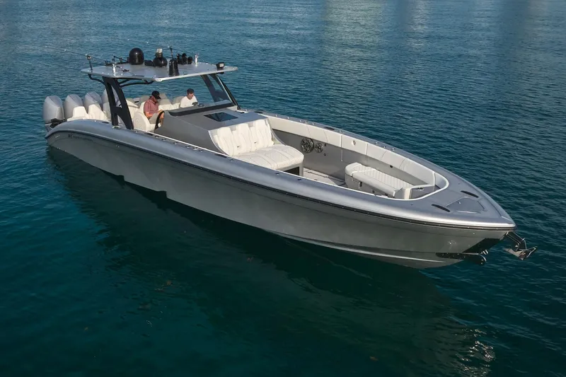 Slide: The Image of 2021 Midnight Express 43' Open luxury boat cruising on clear blue water. - 5