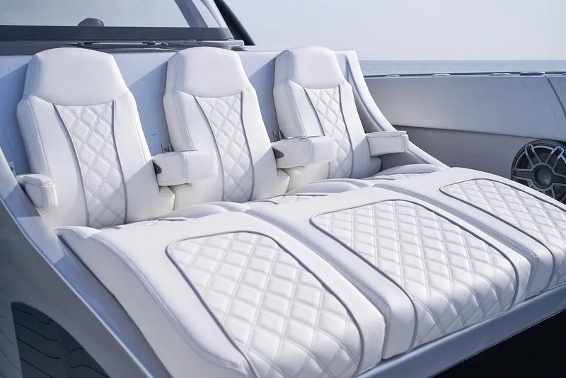 Slide: The Image of Luxurious white leather seats on a 2021 Midnight Express 43' Open boat. - 9