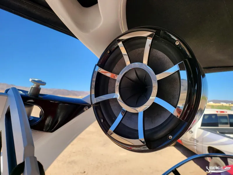 Slide: The Image of Close-up of a 2016 Tigé Z3 boat speaker with chrome accents against a clear blue sky. - 21