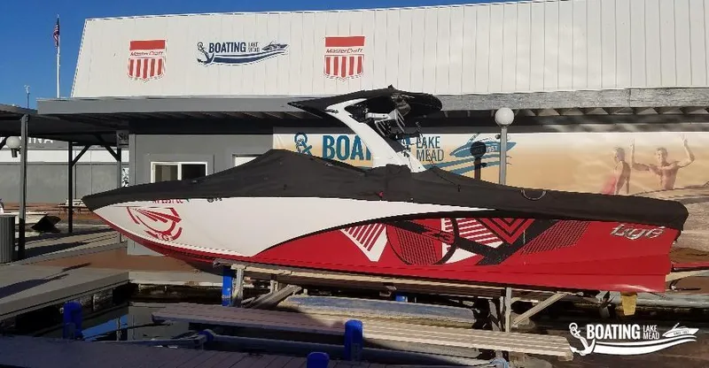 Slide: The Image of 2016 Tigé Z3 boat with cover at Boating Lake Mead dock. - 6