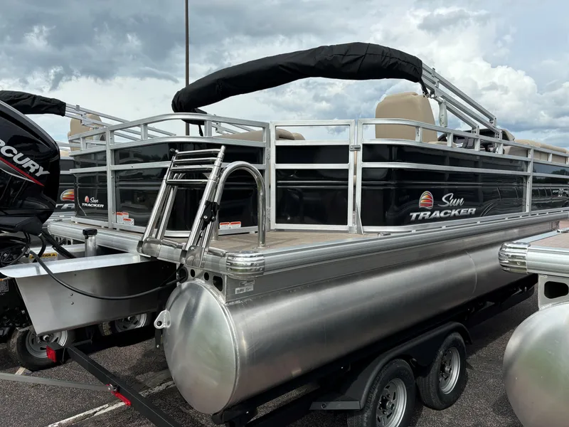 Slide: The Image of 2024 Sun Tracker SportFish 20 DLX pontoon boat on trailer, rear view. - 3