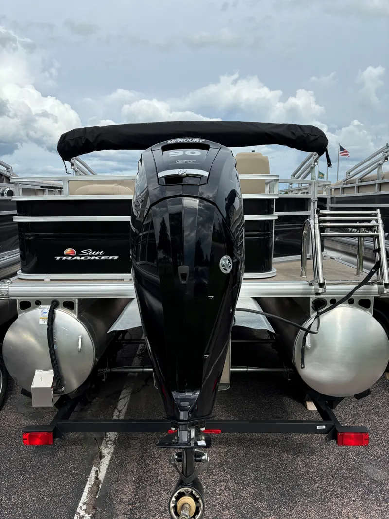 Slide: The Image of 2024 Sun Tracker SportFish 20 DLX pontoon boat with outboard motor. - 4