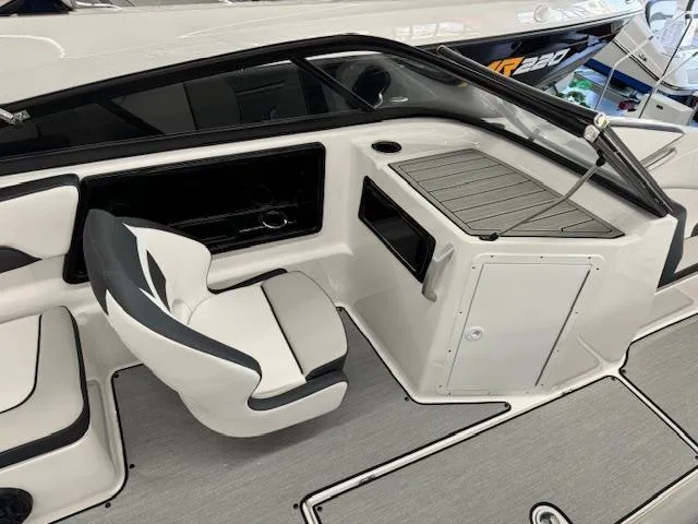 Slide: The Image of 2024 Yamaha Boats SX195 interior with seating and storage compartments. - 12
