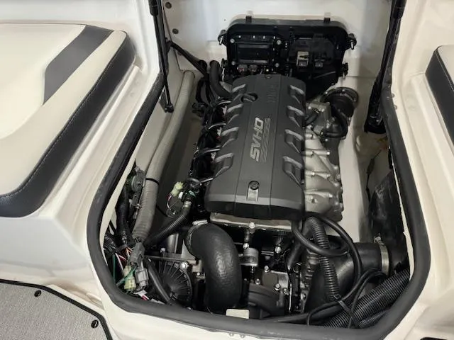 Slide: The Image of 2024 Yamaha Boats SX195 engine compartment with SHO engine. - 19