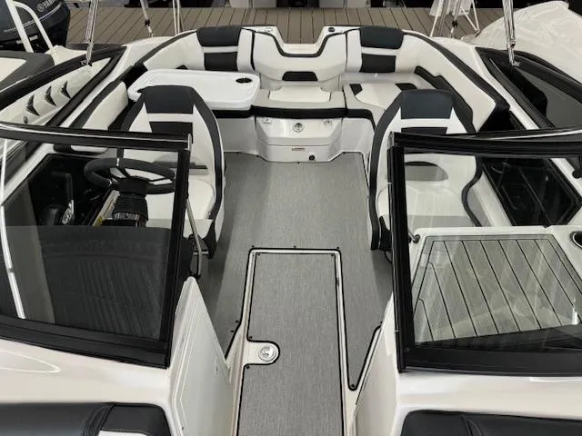 Slide: The Image of 2024 Yamaha Boats SX195 interior, featuring sleek seating and modern design. - 8