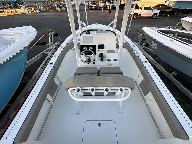 Slide: The Image of 2024 Sea Pro 222 boat interior with console and seating. - 13