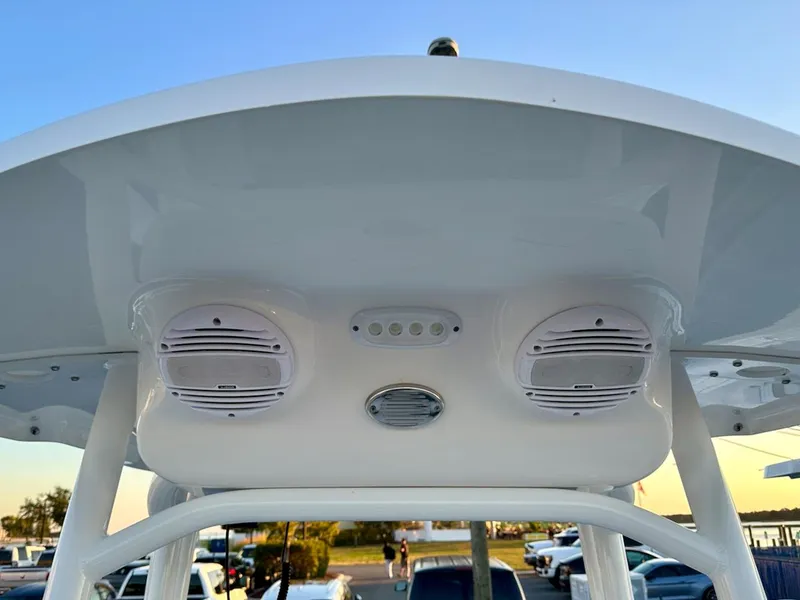 Slide: The Image of 2024 Sea Pro 222 boat T-top with speakers and LED lights. - 3