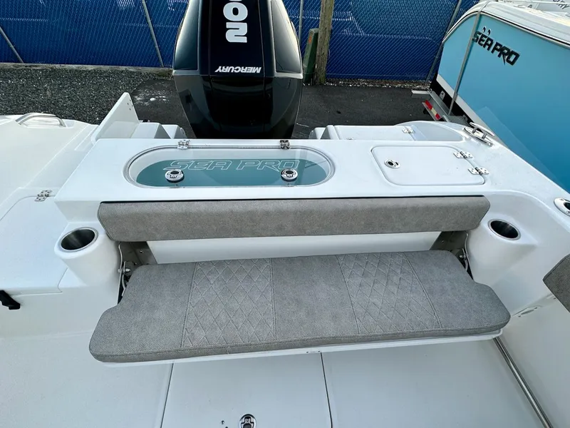 Slide: The Image of 2024 Sea Pro 222 boat with Mercury engine and cushioned seating. - 7