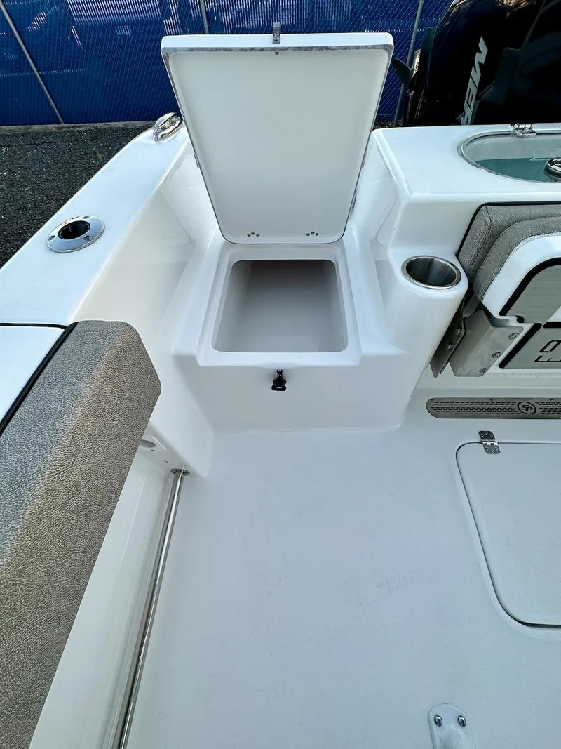 Slide: The Image of 2024 Sea Pro 222 boat with open storage compartment. - 9