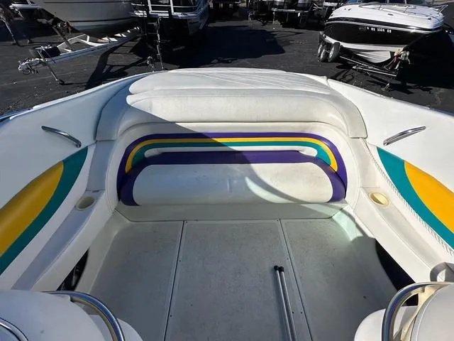 Slide: The Image of 1997 Baja Boss 302 boat dashboard with gauges and controls. - 14