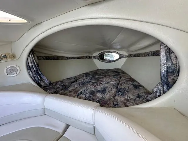 Slide: The Image of 1997 Baja Boss 302 boat control panel with throttle levers and gauges. - 15