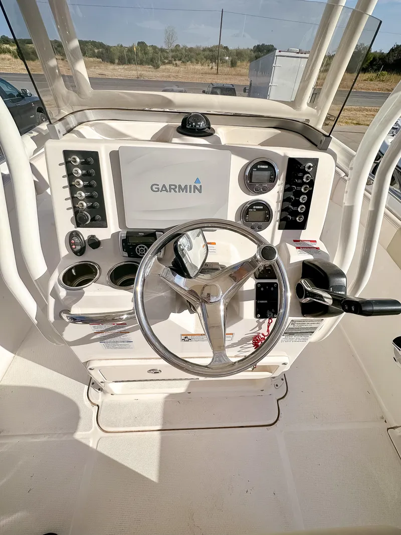 Slide: The Image of 2017 Robalo R222 boat dashboard with Garmin navigation system. - 6