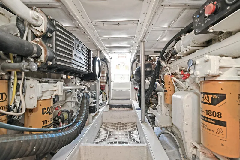 Slide: The Image of Engine room of 2000 Torres 48 Enclosed Bridge with CAT machinery. - 34