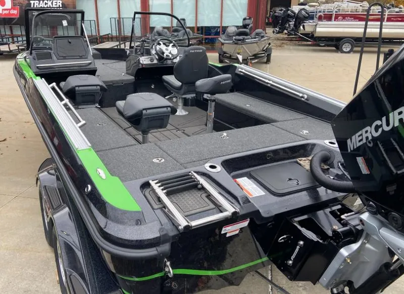Slide: The Image of 2024 Nitro ZV21 fishing boat with Mercury engine, spacious deck, and seating. - 2