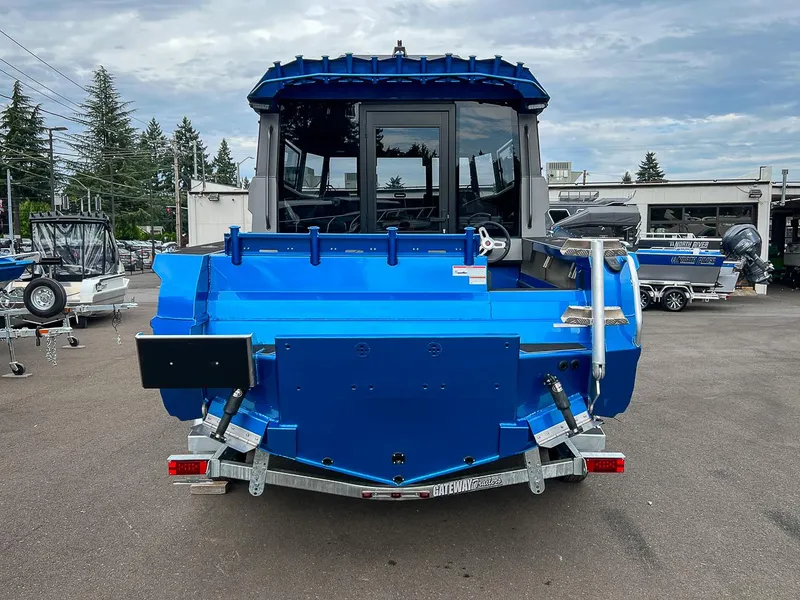 Slide: The Image of 2023 Stabicraft 2250 UltraCab WT boat, rear view, in a dealership lot. - 4