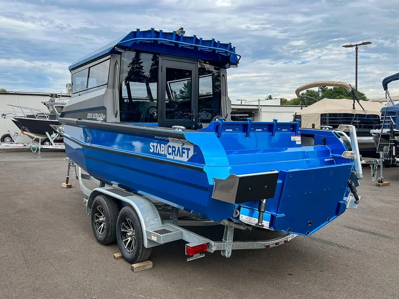 Slide: The Image of 2023 Stabicraft 2250 UltraCab WT boat on a trailer in a marina. - 5