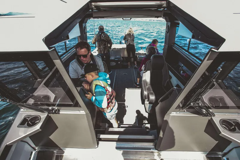 Slide: The Image of 2023 Stabicraft 2250 UltraCab WT with family fishing on open water. - 7