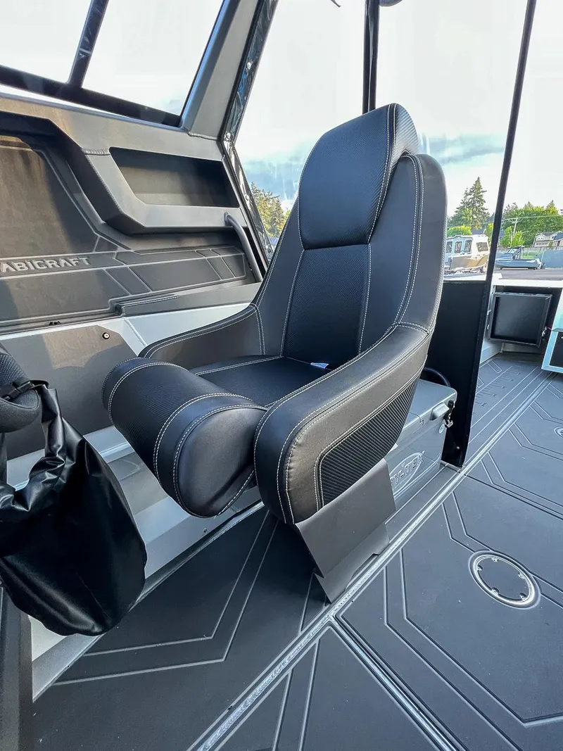 Slide: The Image of Captain's seat in the 2025 Stabicraft 2050 Supercab boat. - 12