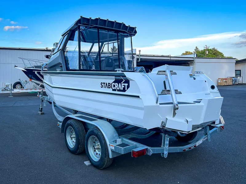 Slide: The Image of 2025 Stabicraft 2050 Supercab boat on a trailer in a parking lot. - 6