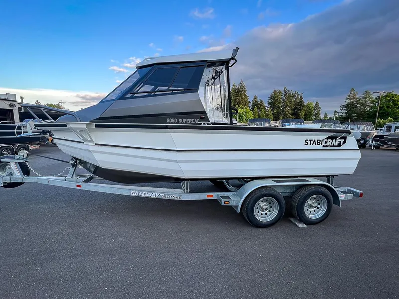 Slide: The Image of 2025 Stabicraft 2050 Supercab boat on a trailer in a parking lot. - 7
