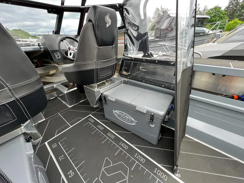 Slide: The Image of Interior of 2025 Stabicraft 1850 Fisher boat with seating and storage. - 12