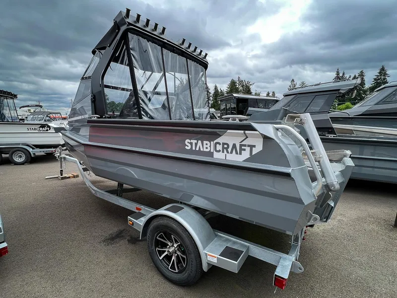 Slide: The Image of 2023 Stabicraft 1850 Fisher boat on trailer under cloudy sky. - 5