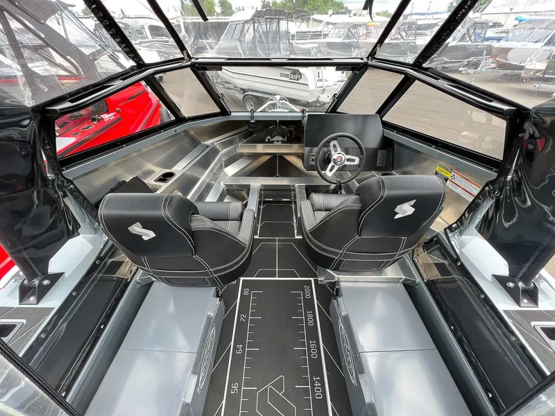 Slide: The Image of 2023 Stabicraft 1850 Fisher boat interior with dual seats and steering console. - 7