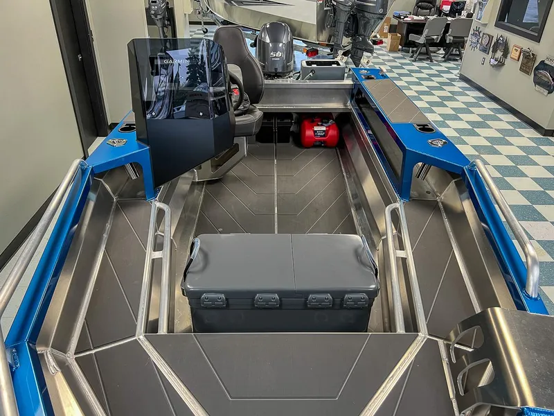 Slide: The Image of 2023 Stabicraft 1450 Frontier boat interior with Garmin navigation system. - 3