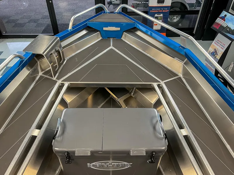 Slide: The Image of 2023 Stabicraft 1450 Frontier boat interior with aluminum finish and storage compartments. - 6
