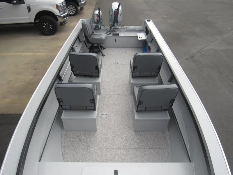 Slide: The Image of 2024 Alumaweld 20 ADVENTURER boat interior with four seats and motor. - 15