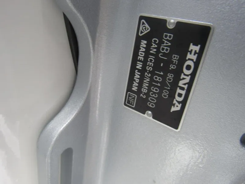 Slide: The Image of Close-up of Honda engine label on 2024 Alumaweld 20 Adventurer boat. - 17