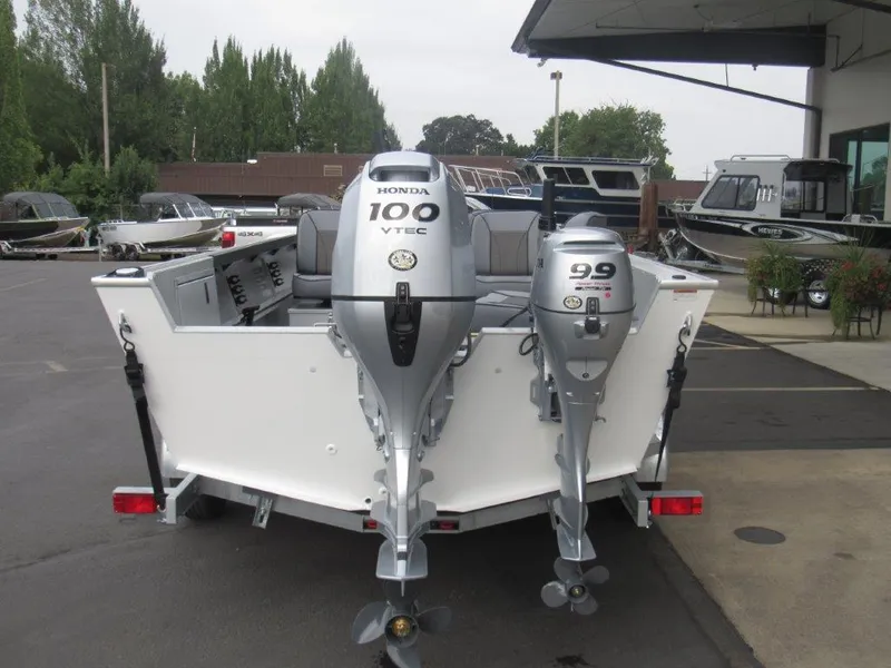 Slide: The Image of 2024 Alumaweld 20 Adventurer boat with Honda 100 VTEC and 9.9 outboard motors. - 4
