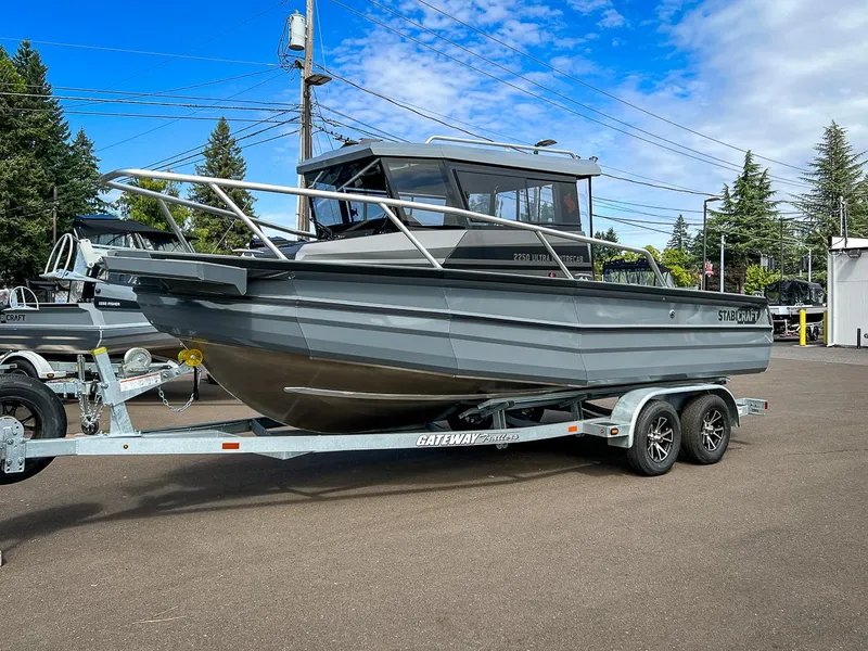 Slide: The Image of 2023 Stabicraft 2250 Ultra Centercab boat on trailer in parking lot. - 1