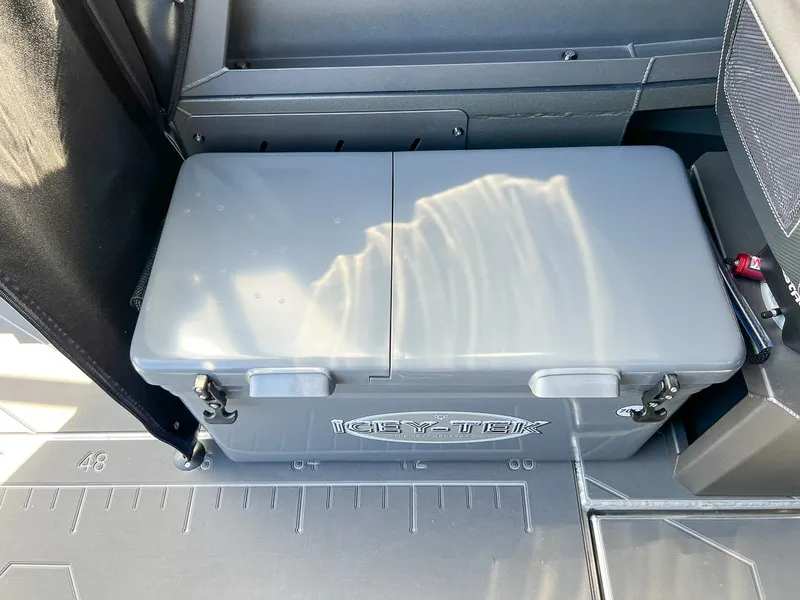 Slide: The Image of 2023 Stabicraft 2250 Ultra Centercab with Icy-Tek cooler on deck. - 16