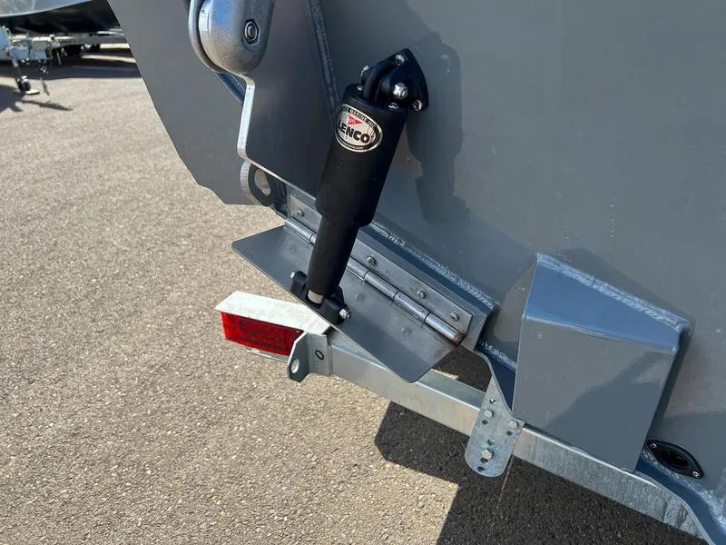 Slide: The Image of Close-up of 2023 Stabicraft 2250 Ultra Centercab boat's trim tab and actuator. - 27