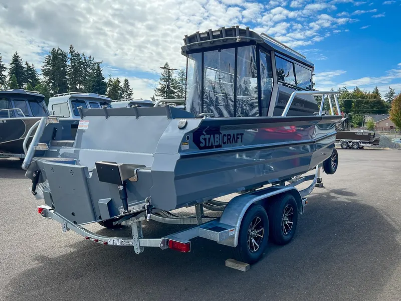Slide: The Image of 2023 Stabicraft 2250 Ultra Centercab boat on trailer, parked outdoors. - 5