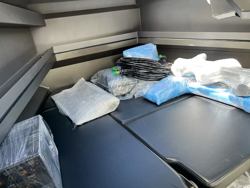 Slide: The Image of Interior of 2023 Stabicraft 2250 Ultra Centercab with packaged equipment. - 9