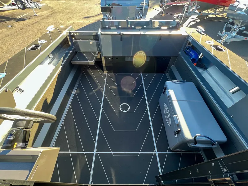 Slide: The Image of 2023 Stabicraft 2250 UltraCab WT boat interior with modern design and storage compartments. - 18