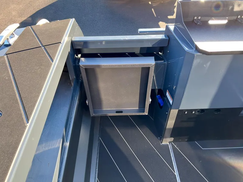 Slide: The Image of 2023 Stabicraft 2250 UltraCab WT interior detail showing storage compartment. - 22