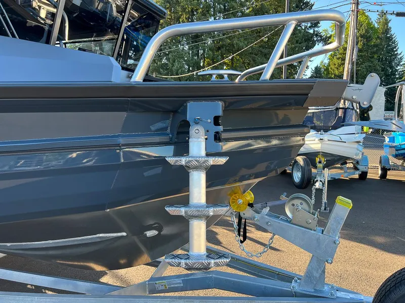 Slide: The Image of 2023 Stabicraft 2250 UltraCab WT boat on trailer, close-up view. - 26
